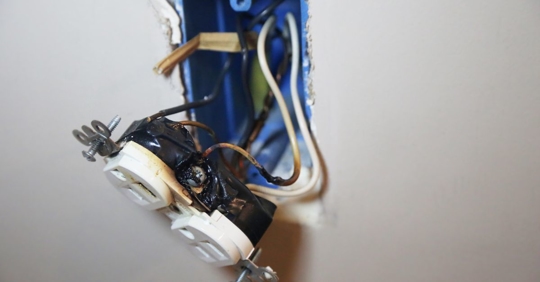 outlet hanging off the wall